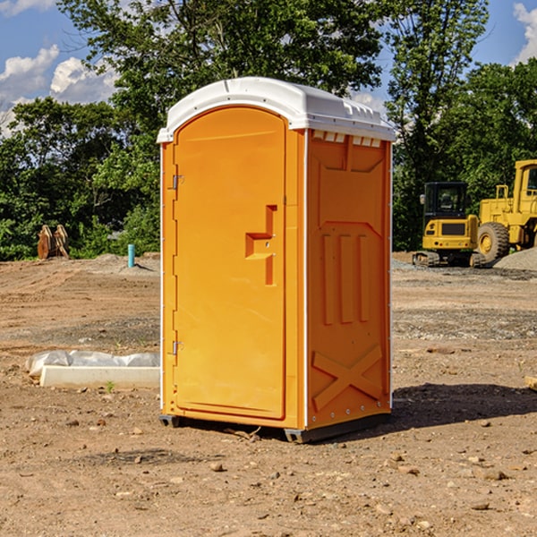 how often are the portable restrooms cleaned and serviced during a rental period in Pere Marquette Michigan